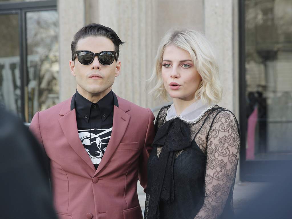 Rami Malek and Lucy Boynton seen at the Miu Miu fashion show during Paris Fashion Week on March 6, 2018, in Paris, France.