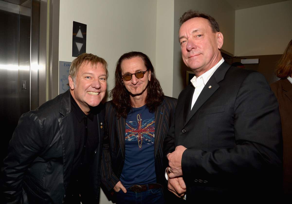 (L-R) Alex Lifeson, Geddy Lee and Neil Peart of Rush attend the 28th Annual Rock and Roll Hall of Fame Induction Ceremony at Nokia Theatre L.A, on April 18, 2013, in Los Angeles, Calif.