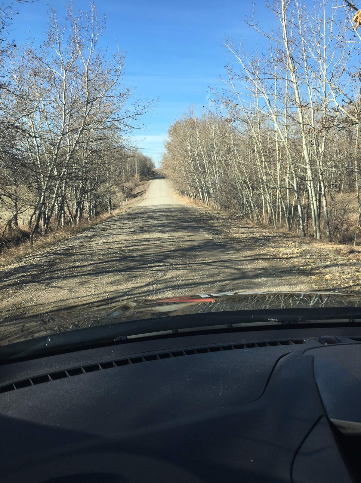Police are investigating after a person was killed and another man was injured in a collision west of Calgary on Oct. 18, 2018.
