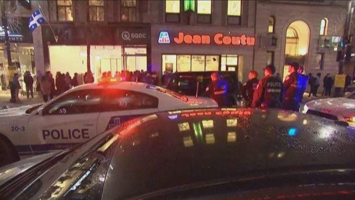Montreal police disperse the crowds hoping to get in to Montreal cannabis store ahead of closing time. Wednesday, Oct. 17, 2018.
