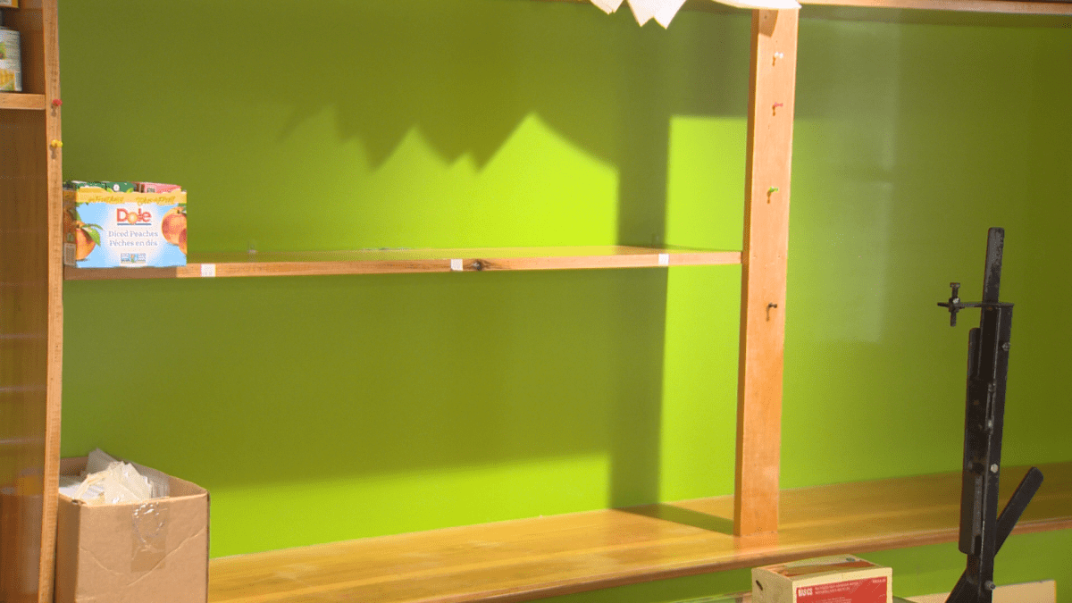 While some shelves in Isthmus Monctno’s food packing space are full, others remain empty