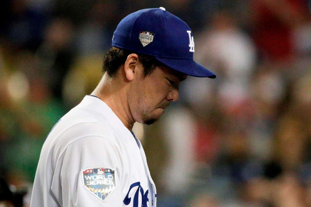 Los Angeles Dodgers pitcher Kenta Maeda leaves the field at the end of the top of the eighth inning against the Boston Red Sox in Game 4 of the World Series on Saturday, Oct. 27, 2018, in Los Angeles. (AP Photo/Jae C. Hong)