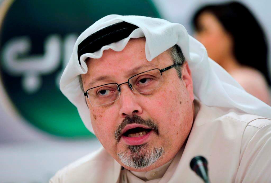 FILE – In this Feb. 1, 2015, file photo, Saudi journalist Jamal Khashoggi speaks during a press conference in Manama, Bahrain.