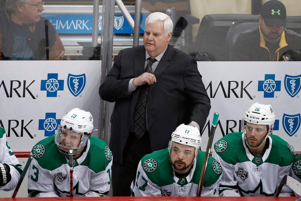 Dallas Stars head coach Ken Hitchcock stands behind his bench in the third period of an NHL hockey game against the Pittsburgh Penguins in Pittsburgh, Sunday, March 11, 2018. The Penguins won 3-1.