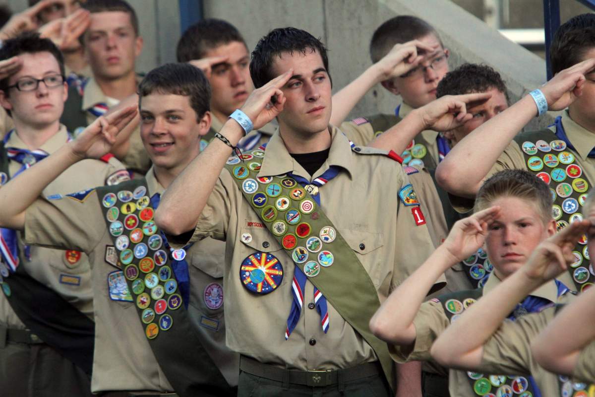 FILE--In this July 3, 2010, file photo, Boy Scouts salute during the Stadium of Fire in Provo, Utah.