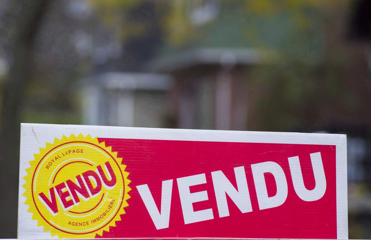 A sold sign is shown on the west island of Montreal, Saturday, November 4, 2017. 