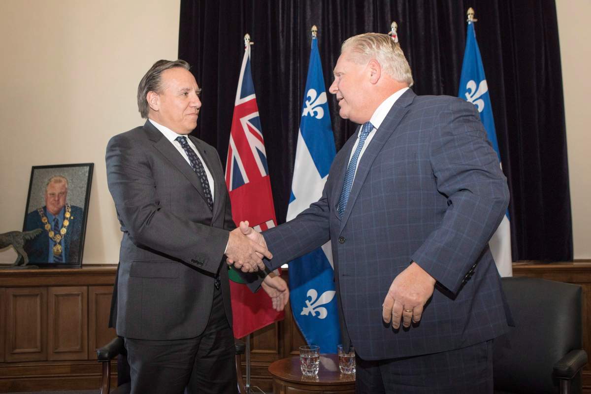 Quebec Premier François Legault, left, meets with Ontario Premier Doug Ford at Queens Park, in Toronto on Monday, Nov. 19, 2018. The pair will meet on Sept. 8 and 9, 2020.