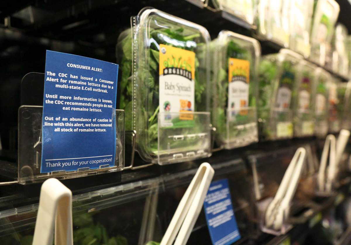 In this Nov. 20, 2018, file photo Romaine lettuce is removed from the shelves of the East End Food Co-op and other local grocery stores due to a recent consumer alert regarding a multi-state E.Coli outbreak in Pittsburgh.