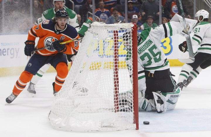 Dallas Stars goalie Anton Khudobin (35) tries to save the puck on a shot from Edmonton Oilers’ Connor McDavid (97), the goal was disallowed during overtime NHL action in Edmonton, Alta., on Nov. 27, 2018.
