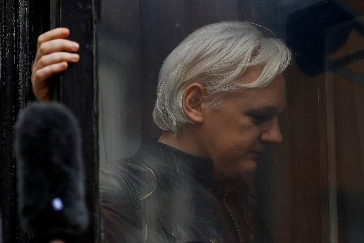 WikiLeaks founder Julian Assange is seen on the balcony of the Ecuadorian Embassy in London, Britain, May 19, 2017.