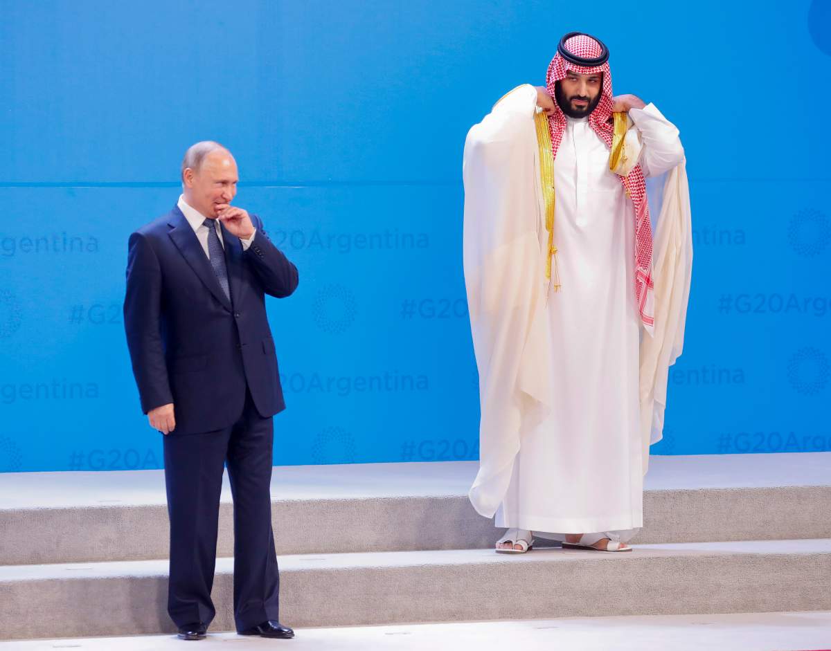 Russia’s President Vladimir Putin, left, and Saudi Arabia’s Crown Prince Mohammed bin Salman wait for other leaders to arrive for the G20 family photo at the Costa Salguero Center in Buenos Aires, Argentina, Friday, Nov. 30, 2018.