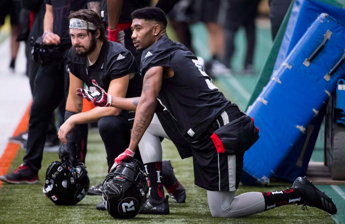 Ottawa Redblacks defensive back Jonathan Rose (9) speaks with teammate defensive back Antoine Pruneau (6) during a team practice in Edmonton, Wednesday, Nov. 21, 2018.