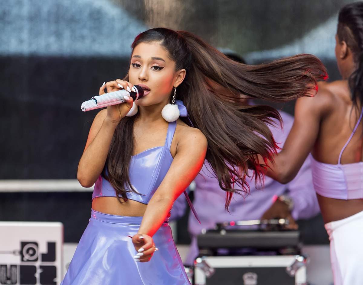 Ariana Grande performs at the ‘ARI by Ariana Grande’ fragrance launch at Macy’s on Sept. 16, 2015 in New York City.