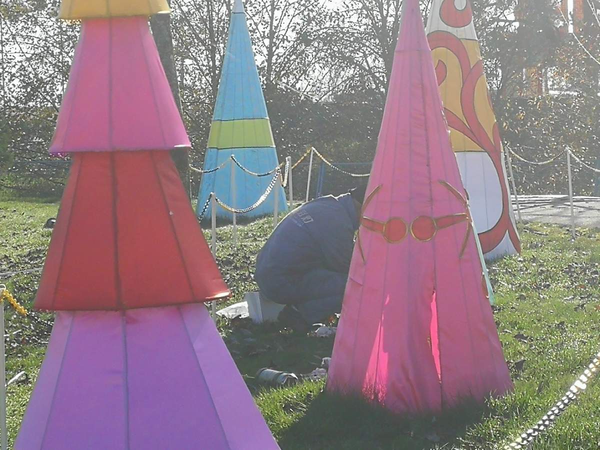 Workers are setting up at the Art of Lights Festival in Cloverdale, although the doors remained closed.