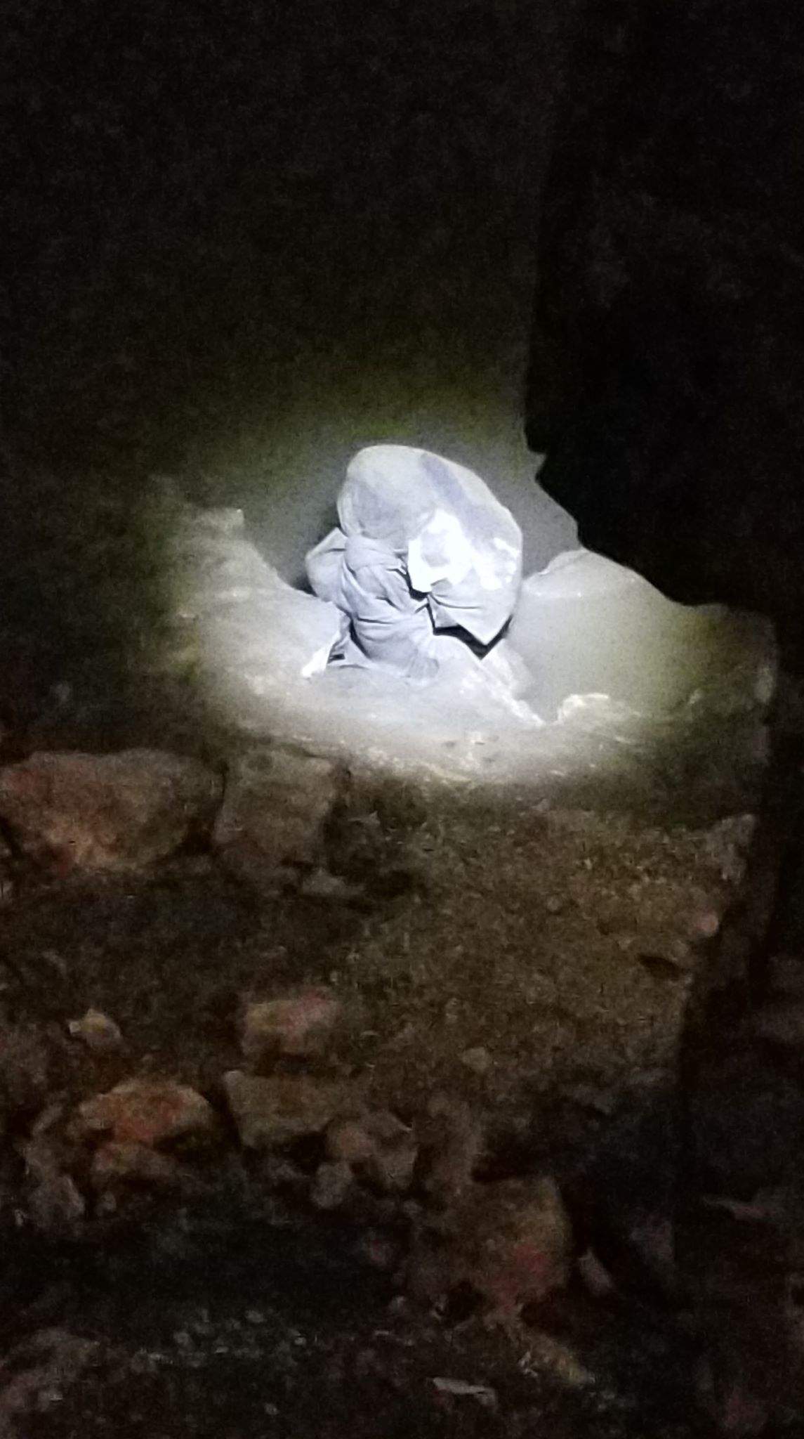 The bag was sitting among rocks along the Red River.