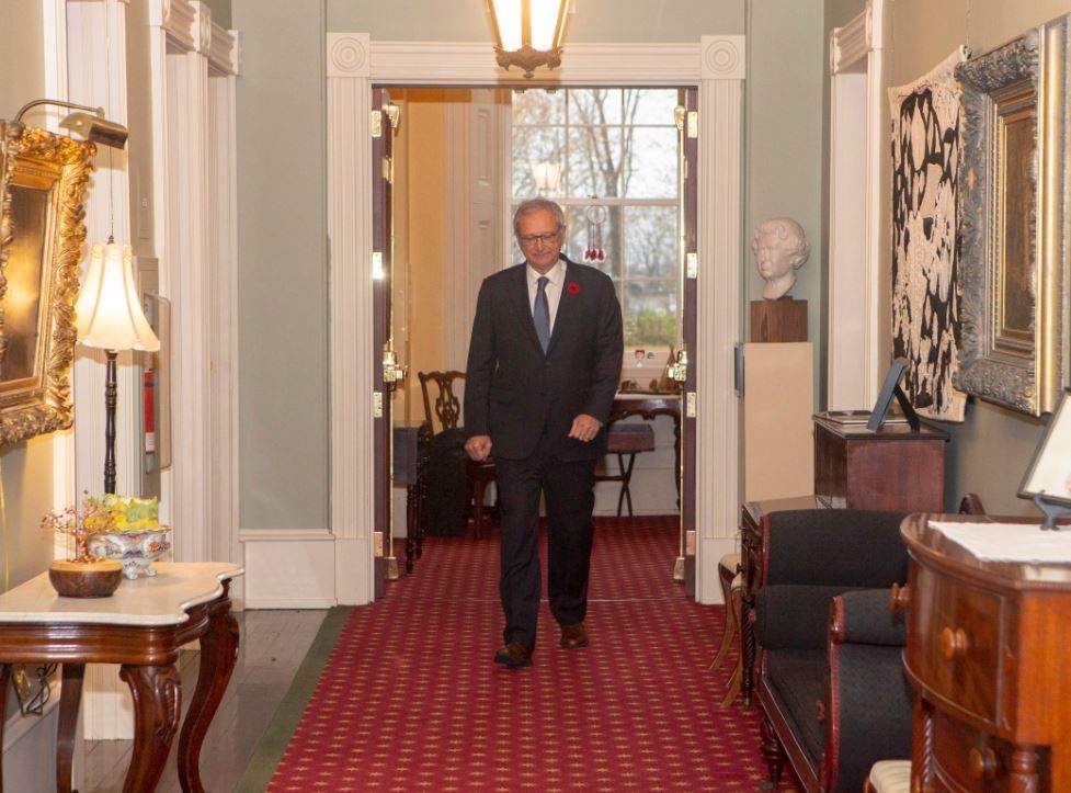 New Brunswick Progressive Conservative Leader Blaine Higgs walks down the hall of Government House after meeting with Lieutenant Governor of New Brunswick Jocelyne Roy-Vienneau at Government House in Fredericton on Friday, Nov. 2, 2018. 