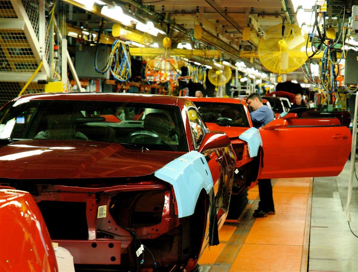 Workers assemble 2010 Chevrolet Camaros at GM’s Oshawa Assembly Plant in this file photo.