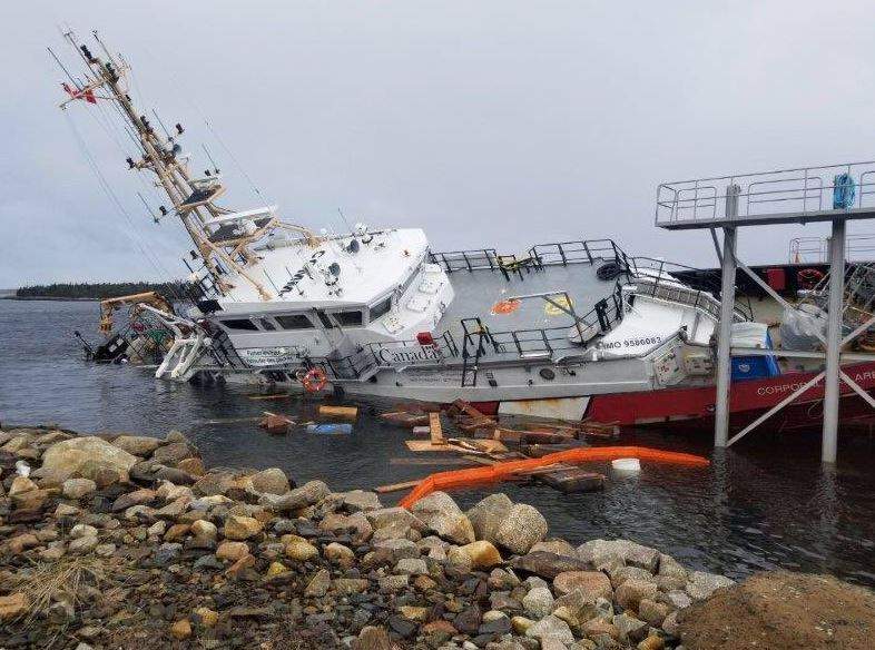 The vessel slipped from its cradle, crashing into the ocean floor and coming to rest partially submerged in the icy water of Sambro Harbour.