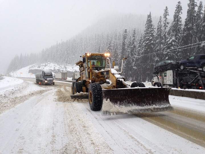 A grader plowing snow on the Coquihalla highway in central B.C. on November 14, 2018.