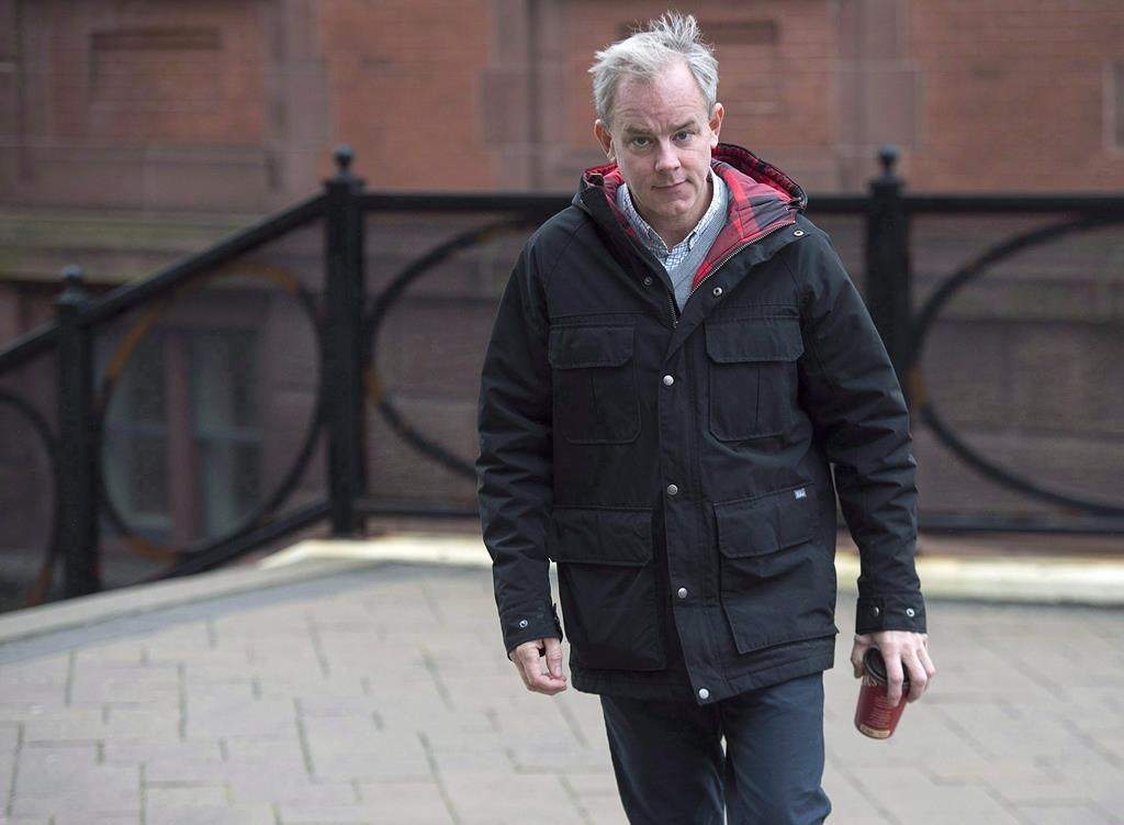 Dennis Oland arrives at the Law Courts in Saint John, N.B., on Tuesday, Nov. 6, 2018.