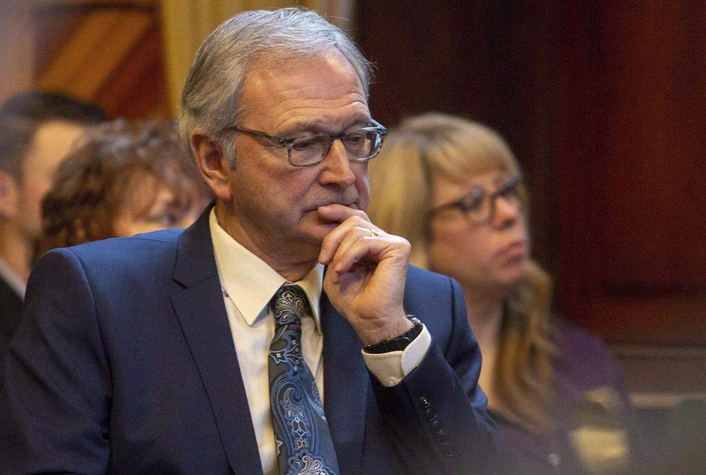 New Brunswick Premier Blaine Higgs listens on as Lt. Gov. Jocelyne Roy Vienneau reads his government’s Throne Speech at the New Brunswick Legislature in Fredericton, N.B., on Nov. 20, 2018. THE CANADIAN PRESS/James West