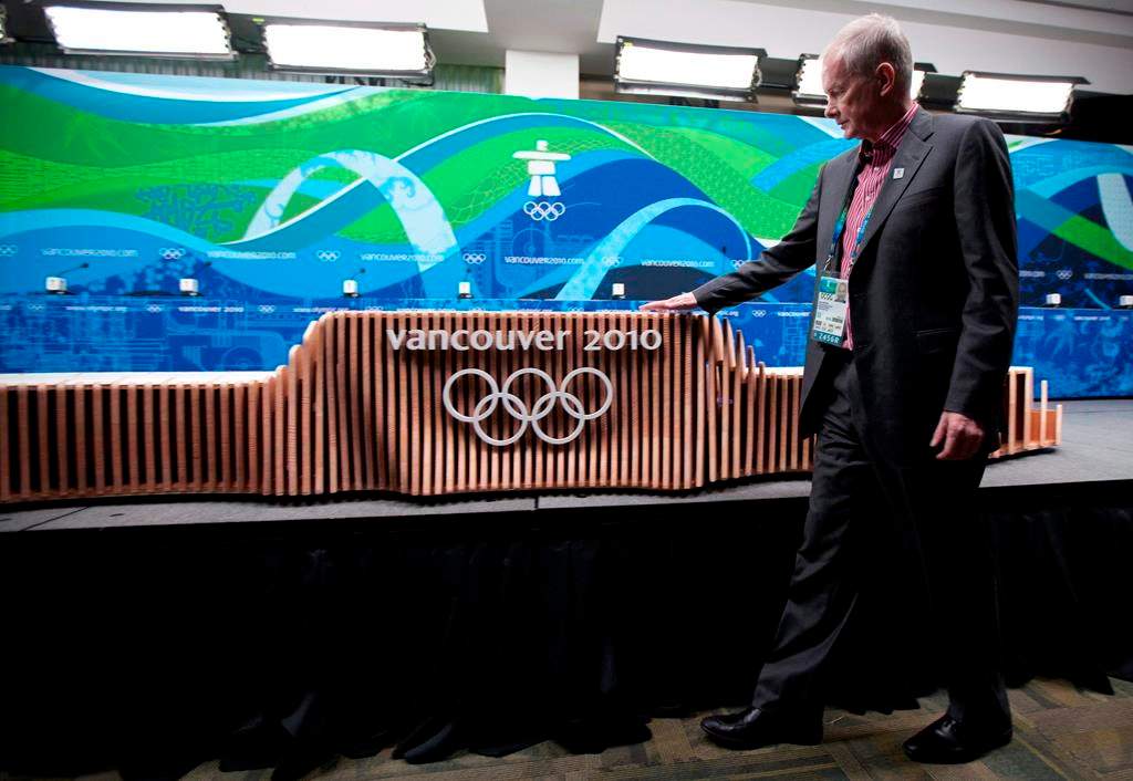 VANOC Chief Executive Officer John Furlong checks out the victory ceremony podium for the Vancouver 2010 Winter Olympic Games during an unveiling news conference in Vancouver on February 2, 2010.