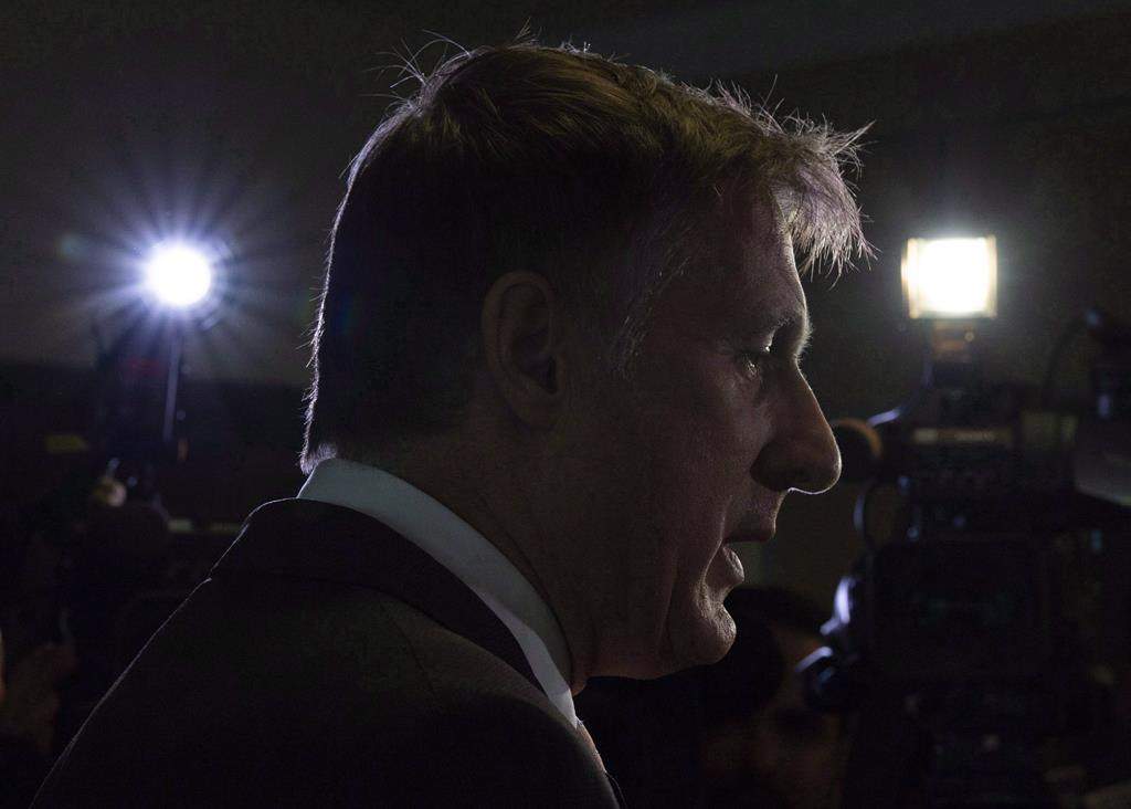 Maxime Bernier speaks with the media after filing papers for the Peoples Party of Canada at the Elections Canada office in Gatineau, Que., Wednesday, October 10, 2018.