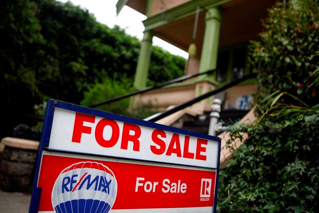 A real estate sign is shown in Victoria, B.C., on Friday, June 1, 2018. They say breaking up is hard to do - and that most often can be the case when it comes to leaving your realtor. Although not overly common, there may come a time when you want to ditch the real estate agent you have entrusted to sell or buy you a home.