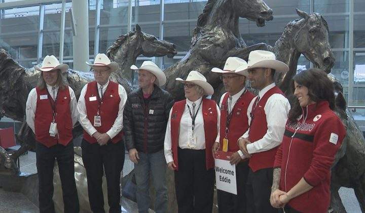 Eddie the Eagle (in black jacket) arrived in Calgary to throw his support behind the 2026 Olympic bid.
