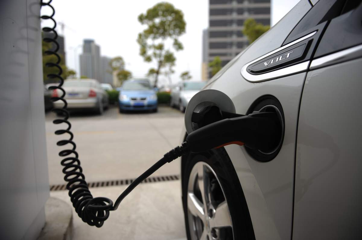This photo taken on April 19, 2013 shows a Chevrolet Volt electric car being charged in a parking lot at General Motors (GM) China headquarters in Shanghai.