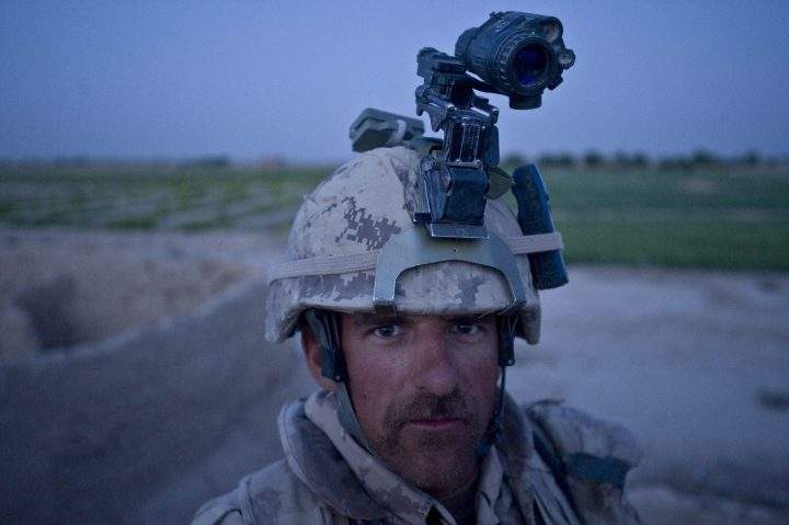 A Canadian Forces soldier is shown with a night-vision camera attached to his helmet before a patrol in Panjwaii, Kandahar, Afghanistan on Apr. 18, 2010.