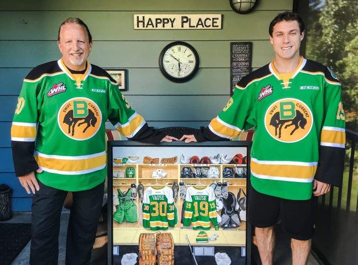 Dean and Taylor Vause wearing the jerseys Taylor designed.