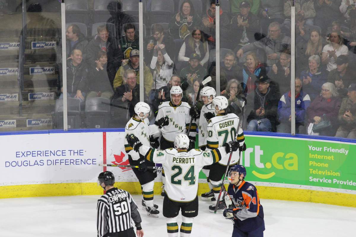 The London Knights celebrate the first goal of the game by Nathan Dunkley.
