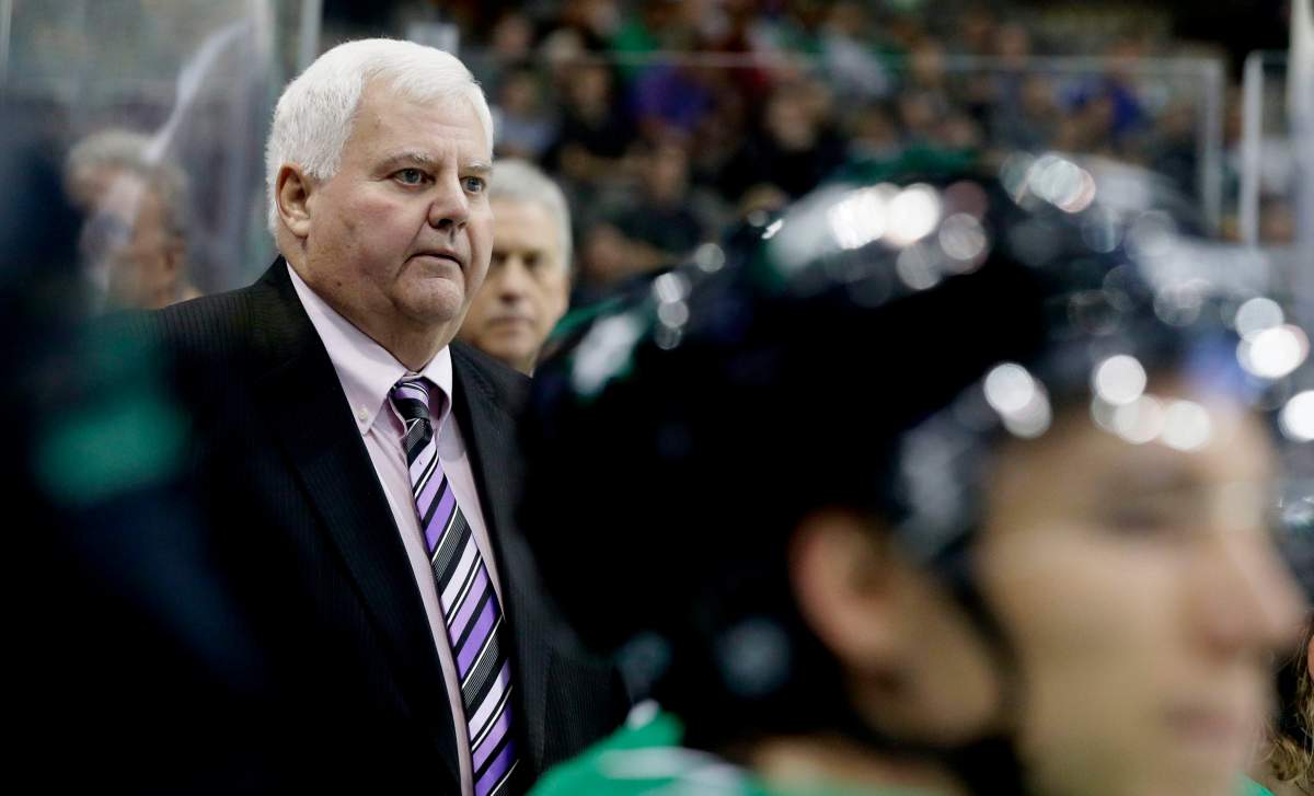 FILE – In this Tuesday, Sept. 26, 2017 file photo, Dallas Stars head coach Ken Hitchcock looks on from the bench during the first period of a preseason NHL hockey game against the Minnesota Wild in Dallas.