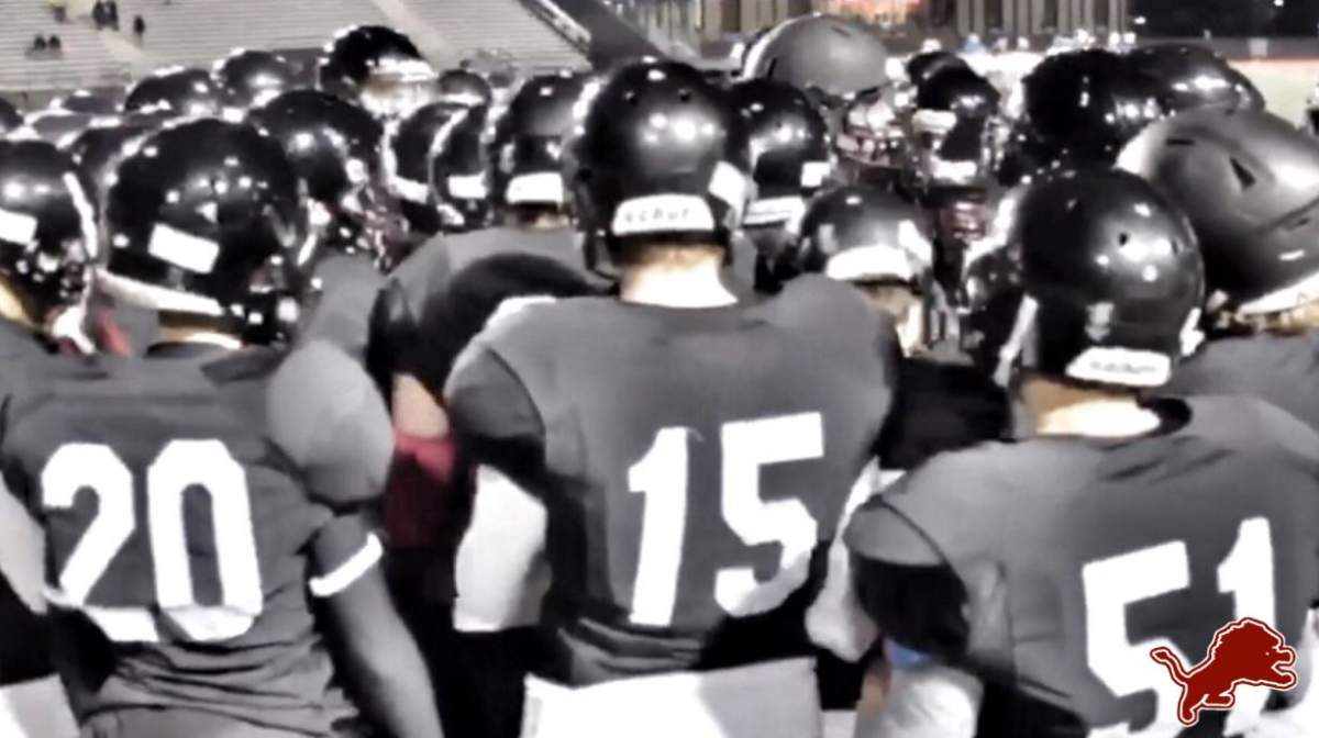 Lions get ready in the huddle.