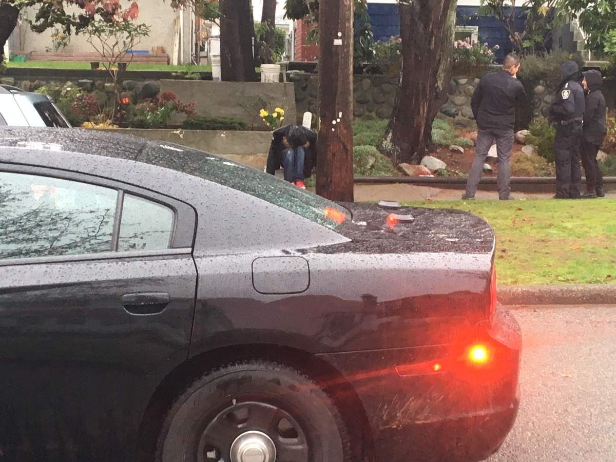 Vancouver police on scene on Vivian Street, where one man was taken into custody. Credit: Mike Timbrell / Global News