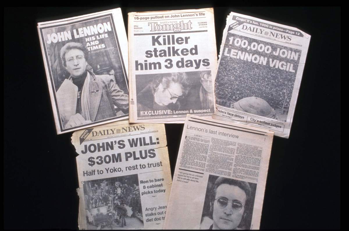 The front pages of several newspapers are on display Dec. 2, 1995 in New York City at the memorial for John Lennon in “Strawberry Fields.”