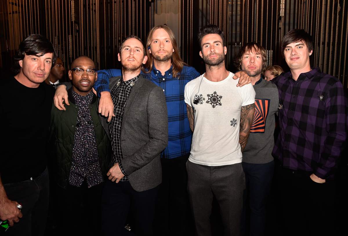 (L-R) Matt Flynn, PJ Morton, Jesse Carmichael, James Valentine, Adam Levine, Mickey Madden, and Sam Farrar of Maroon 5 at The Shrine Auditorium on Nov. 18, 2014, in Los Angeles, Calif.