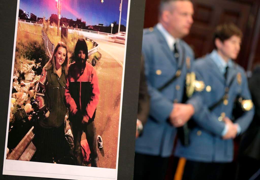 A picture of Katelyn McClure and Johnny Bobbitt Jr. is displayed during a news conference in Mt. Holly, N.J., Thursday, Nov. 15, 2018.