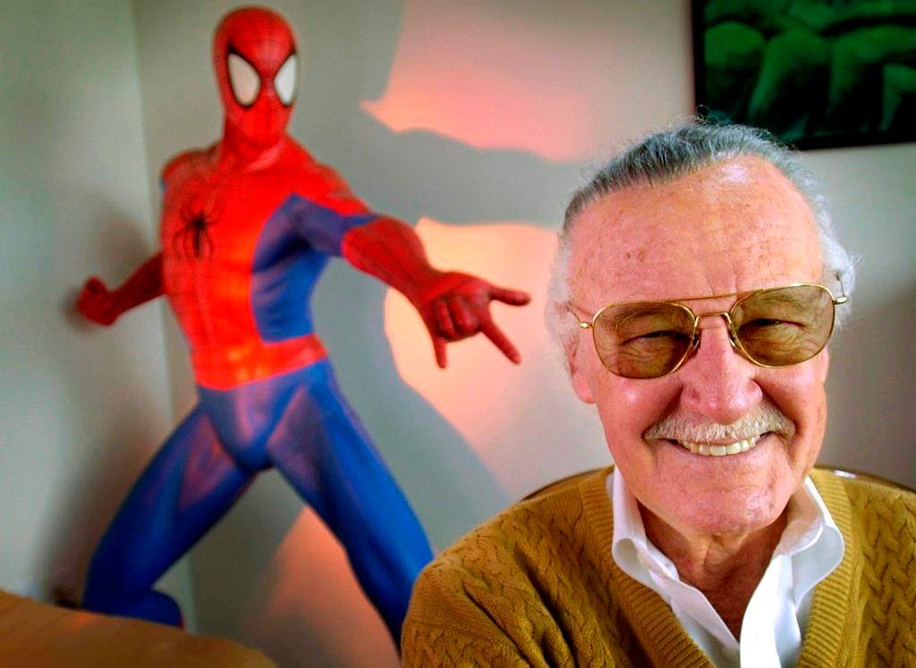 FILE – In this April 16, 2002, file photo, Stan Lee, 79, creator of comic-book franchises such as “Spider-Man,” “The Incredible Hulk” and “X-Men,” smiles during a photo session in his office in Santa Monica, Calif. (AP Photo/Reed Saxon)