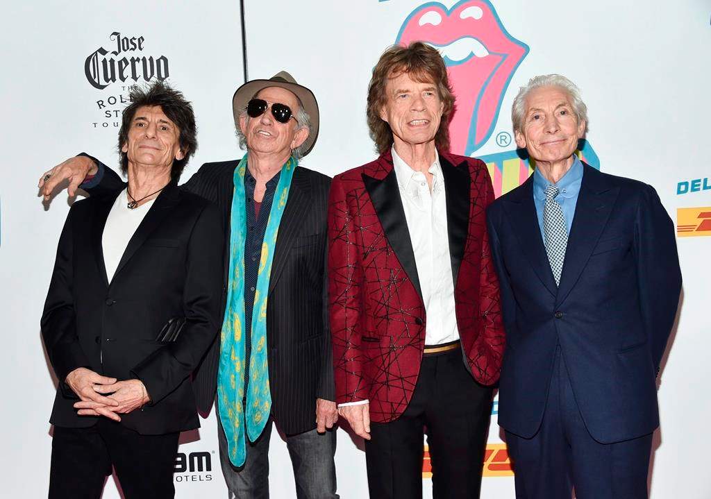 FILE - In this Nov. 15, 2016 file photo, The Rolling Stones, from left, Ronnie Wood, Keith Richards, Mick Jagger and Charlie Watts attend the opening night party for "Exhibitionism" in New York. The Rolling Stones will be rolling through the U.S. next year. The band says it is adding a 13-show leg to its No Filter tour in spring 2019, kicking off in Miami on April 20.
