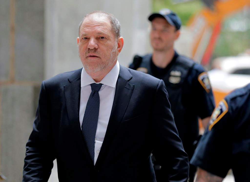 FILE - In this Oct. 11, 2018 file photo, Harvey Weinstein arrives to court in New York. Weinstein's lawyers are making a new attempt to get the New York sexual assault case against him dismissed. The former Hollywood producer's attorneys say in a court filing Monday, Nov. 5, his indictment was "irreparably tainted by police misconduct," among other problems. (AP Photo/Seth Wenig, File).