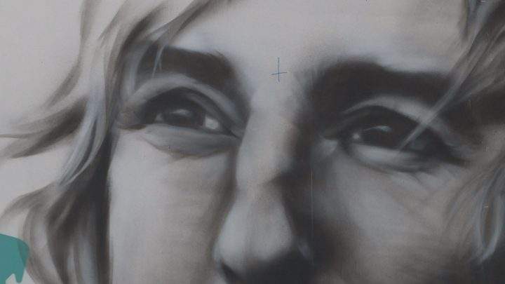 Calgary artist Alex Kwong brightened the mood and the CTrain platform with a painting of Owen Wilson.