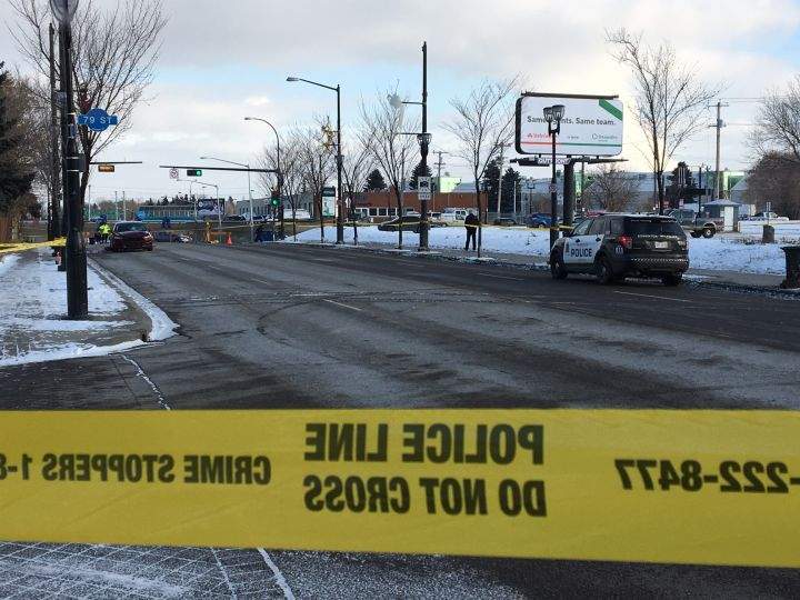 Police investigate a collision between a vehicle and a pedestrian in the area of 79 Street and 118 Avenue in Edmonton Thursday, Nov. 8, 2018.