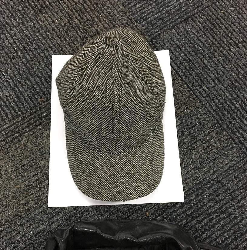 A grey hat worn by the victim of a fatal hit and run.