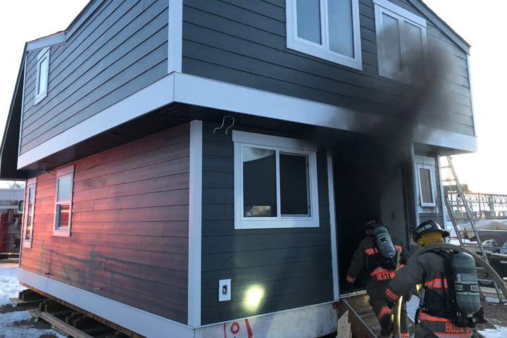 A Saskatoon fire investigator determined the cause to be building materials placed too close to a construction heater.