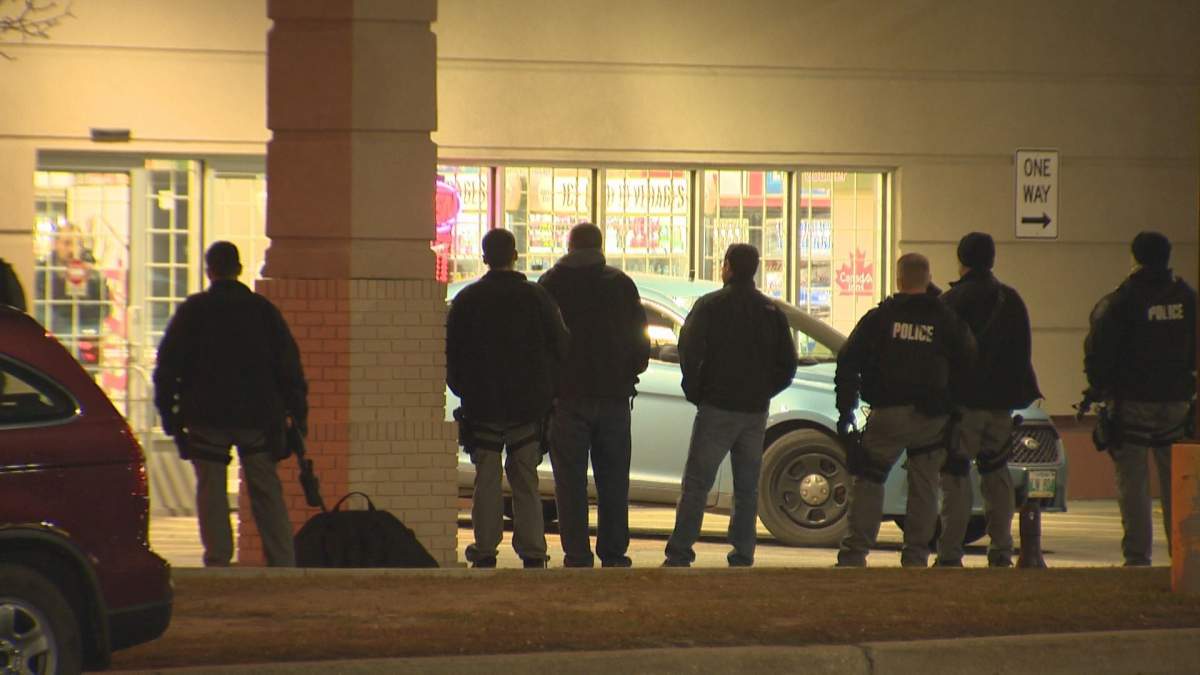 The crisis negotiation unit at an armed standoff on Pembina Highway.