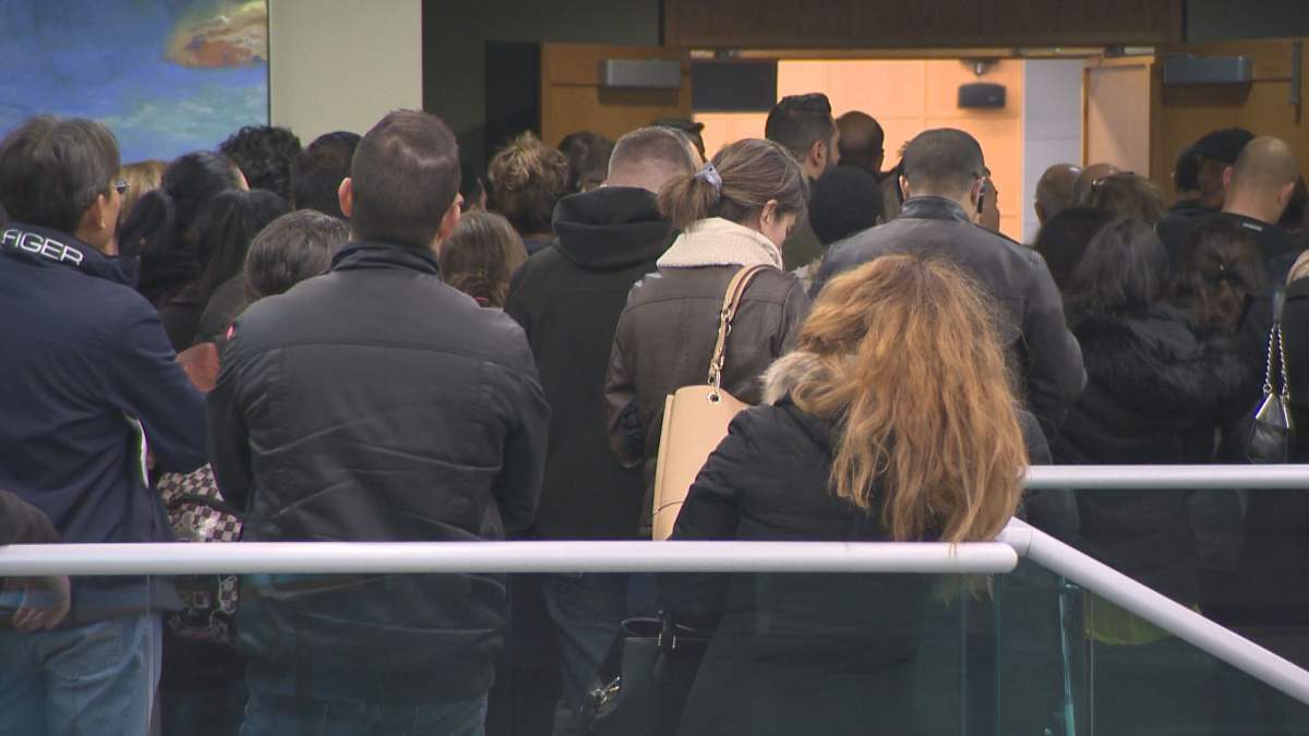 Potential jurors pack the Laval courthouse on Tuesday, November 6, 2018.
