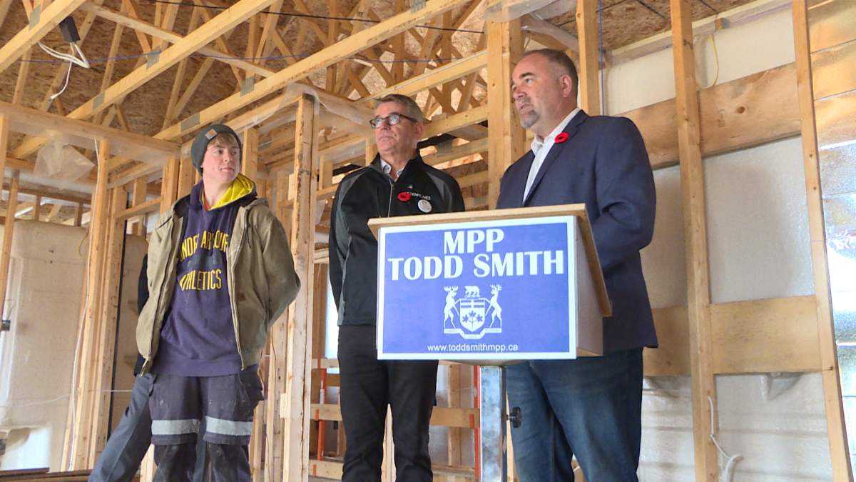 Todd Smith at a news conference. 