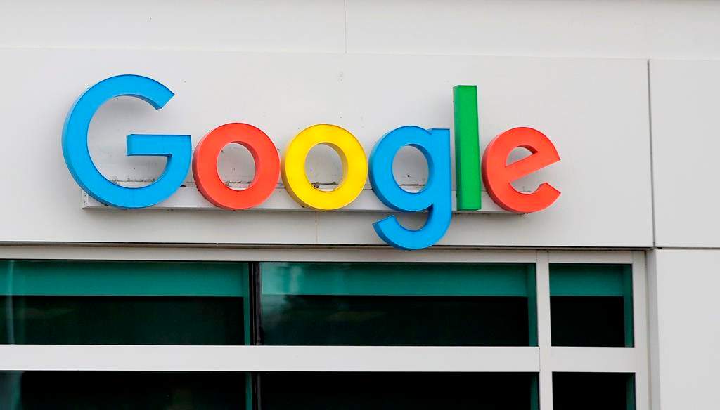 A sign on a building at the Google campus in Kirkland, Wash. is shown Thursday, Nov. 1, 2018. Google employees in Kirkland and around the world briefly walked off the job Thursday in a protest against what they said is the tech company's mishandling of sexual misconduct allegations against executives. (AP Photo/Ted S. Warren).